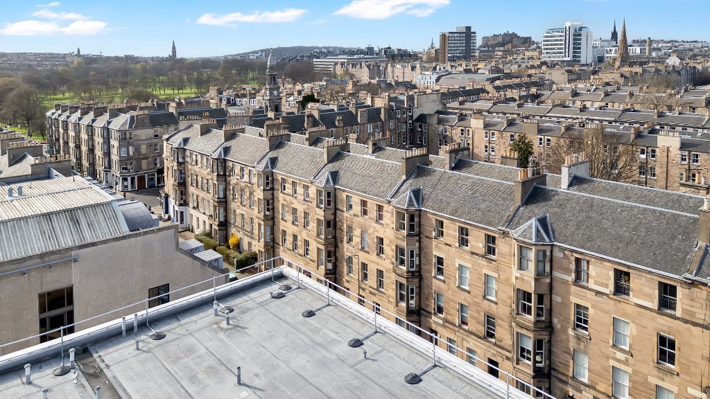 Aerial view across Edinburgh with the castle on the skyline